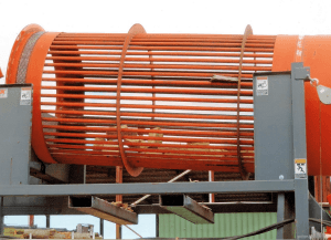 The processed wood is cleaned in the tumbler, which removes slithers and bark