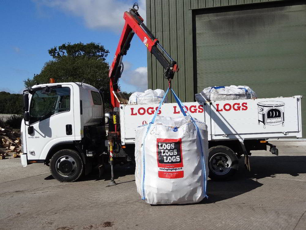 The bags are unloaded and placed by the crane.